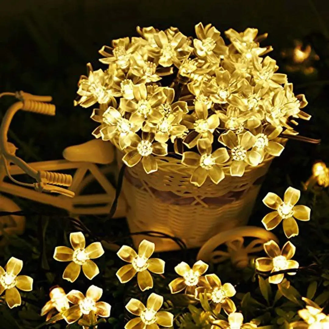 NOVALUC 40 Led Blossom Flower Decoration Lights Plug In Fairy String Lights (6 Meters, Steady,Warm White)(Pvc + Copper)